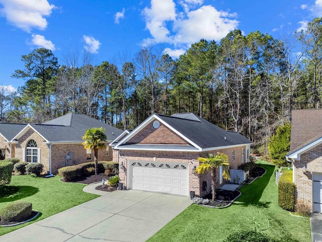 ranch-style home featuring brick siding, a shingled roof, an attached garage, driveway, and a front lawn