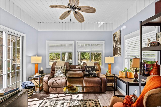 interior space featuring a ceiling fan and wood ceiling