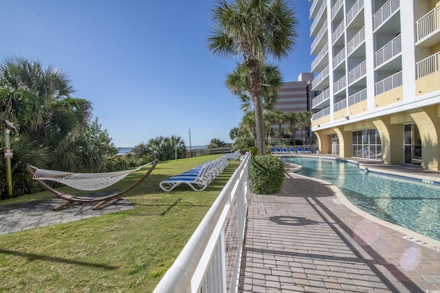 pool featuring a lawn