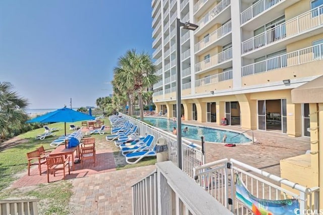 pool with a patio