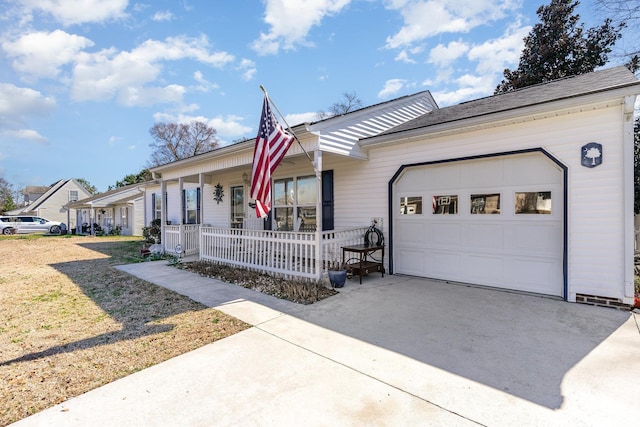 ranch-style house with a garage, concrete driveway, and a porch