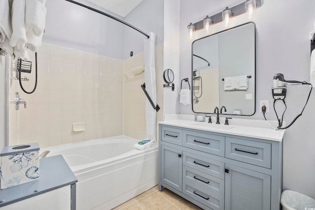 bathroom featuring shower / bathtub combination with curtain, vanity, and tile patterned floors