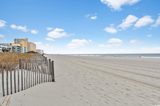 1501 S Ocean Blvd Unit 1005, Myrtle Beach, SC 29577 - view of home's community with a water view, fence, and a beach view