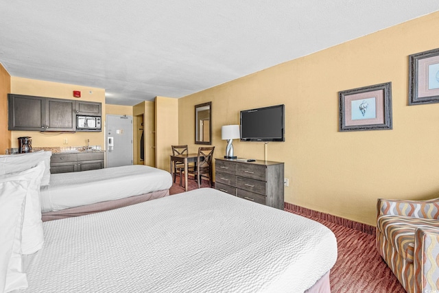 1501 S Ocean Blvd Unit 1005, Myrtle Beach, SC 29577 - bedroom featuring baseboards and carpet floors