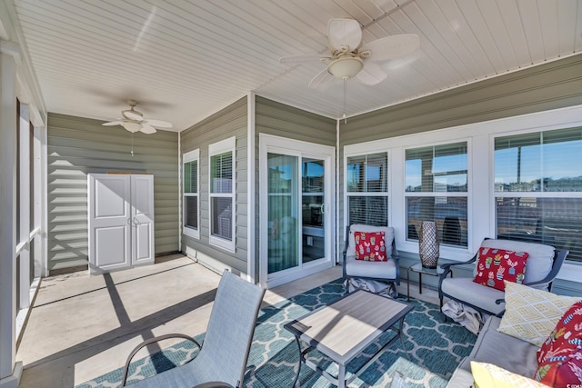 exterior space featuring a ceiling fan