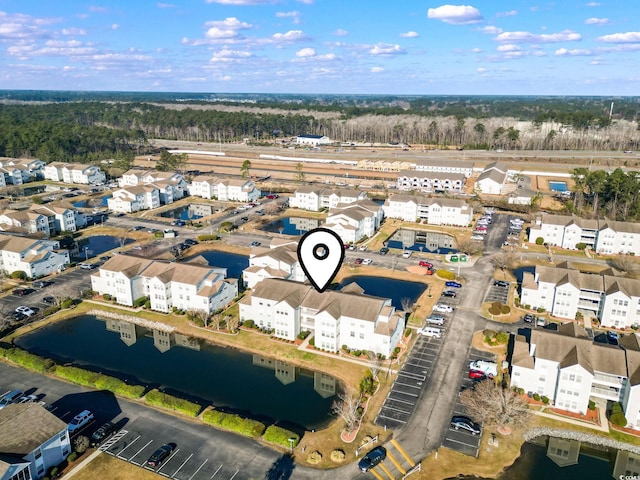 aerial view with a residential view and a water view