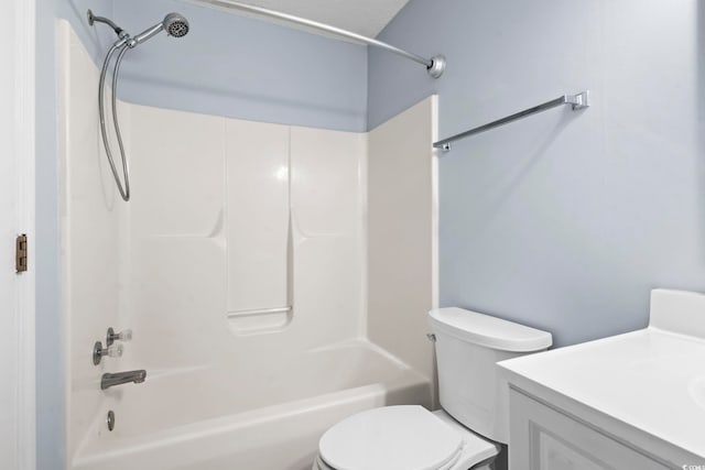 full bath with vanity, bathtub / shower combination, and toilet