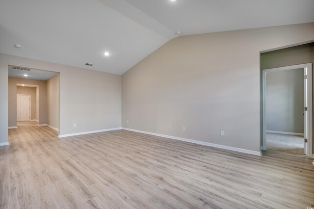 179 Glengrove Ln, Murrells Inlet, SC 29576 - empty room featuring light wood-style floors, baseboards, lofted ceiling, and visible vents
