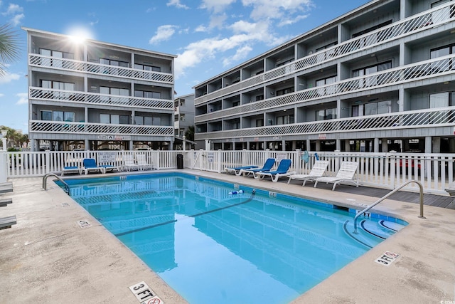 pool featuring fence