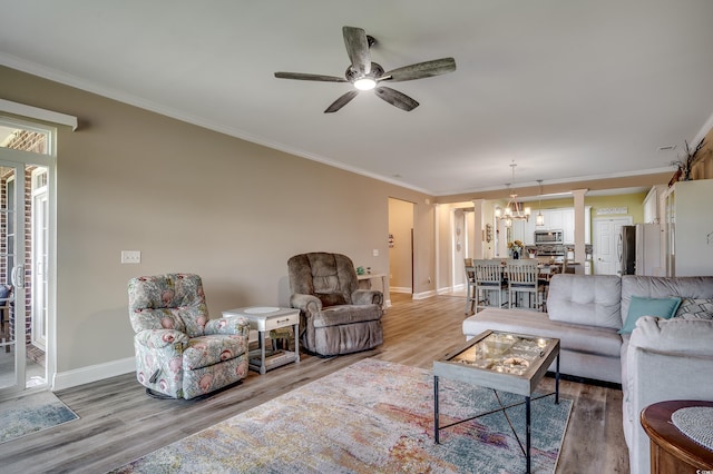 living room with light wood finished floors and baseboards