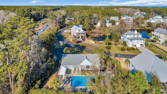 drone / aerial view featuring a view of trees