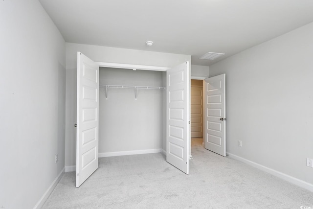 4036 Bucolic Loop, Myrtle Beach, SC 29588 - unfurnished bedroom featuring light colored carpet and a closet