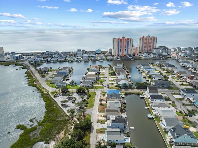 drone / aerial view with a view of city and a water view