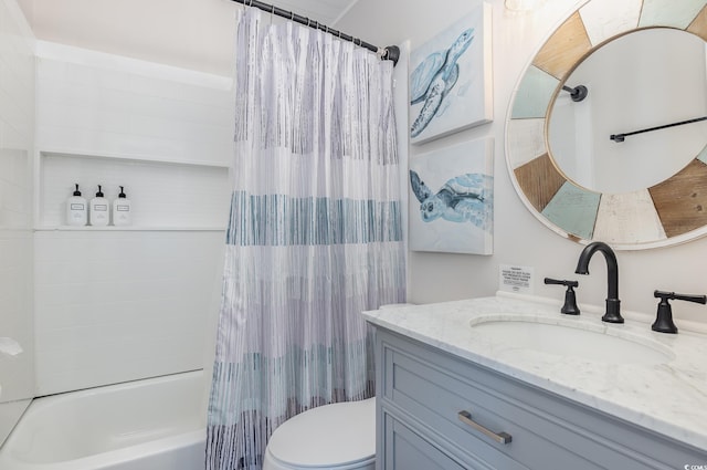 bathroom with toilet, shower / bath combo, and vanity