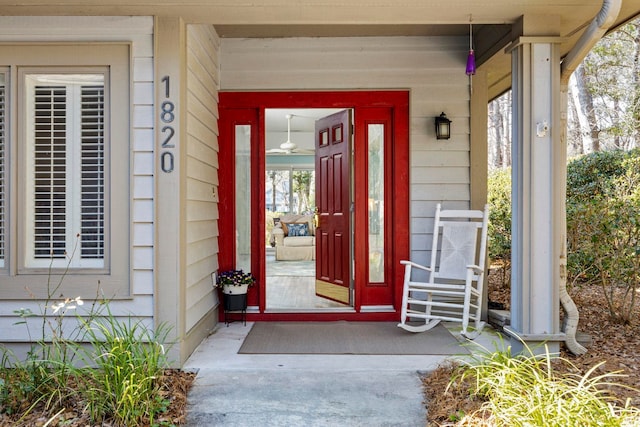 entrance to property featuring a porch