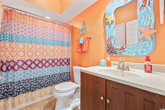 full bathroom featuring tile patterned flooring, a shower with shower curtain, vanity, and toilet