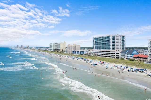 property view of water featuring a view of city and a beach view