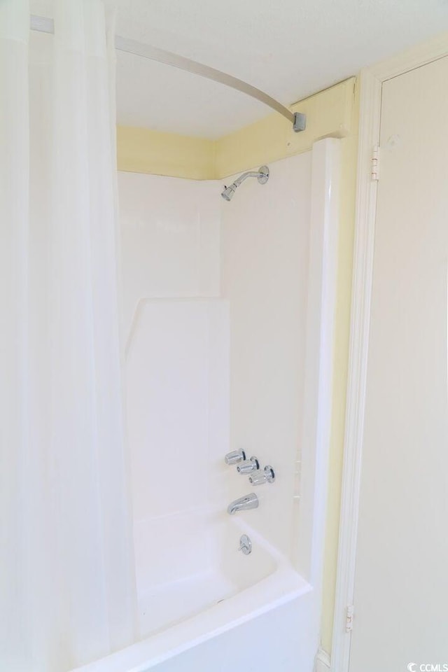 full bathroom with shower / bath combination