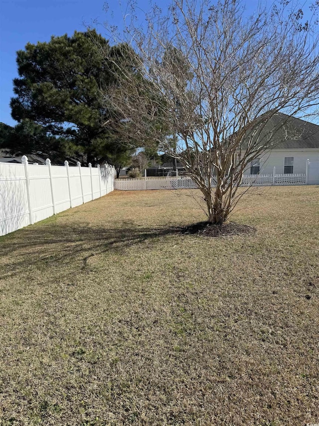 view of yard featuring fence