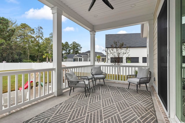 exterior space with a ceiling fan