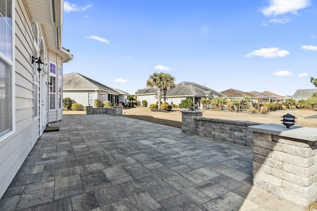 view of patio / terrace with a residential view