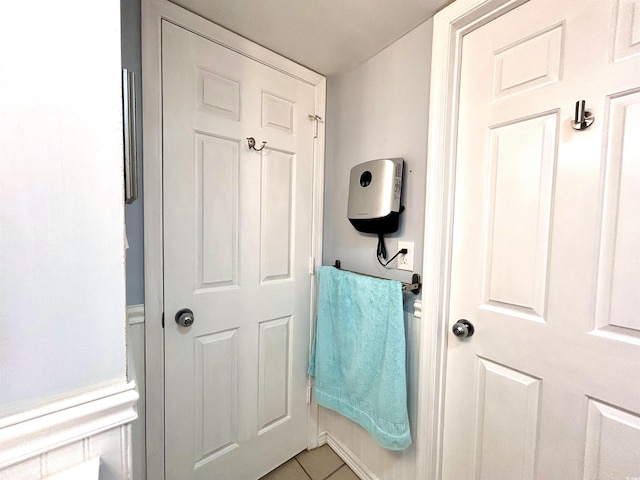 bathroom featuring tile patterned flooring