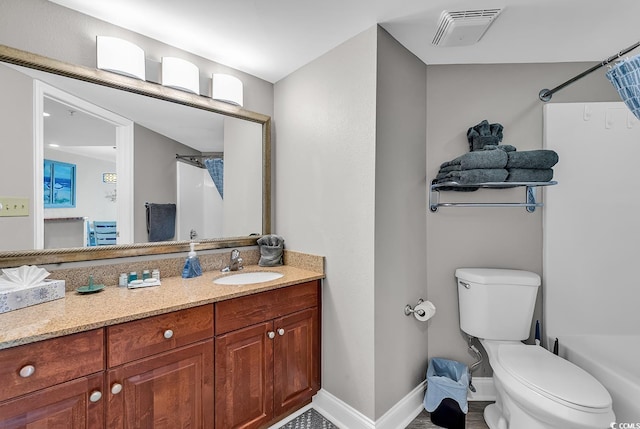 full bath featuring toilet, vanity, visible vents, and baseboards