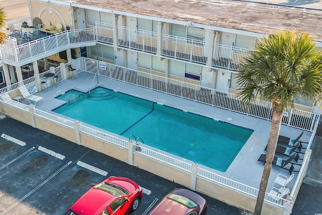 community pool with fence