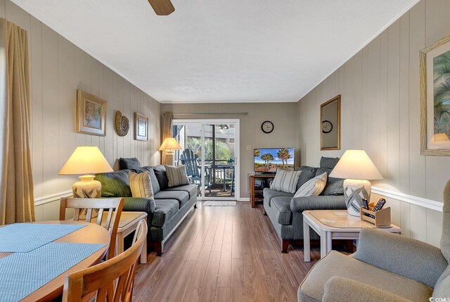 9501 Shore Dr Unit D-132, Myrtle Beach, SC 29572 - living room with a ceiling fan and wood finished floors