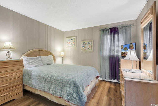 9501 Shore Dr Unit D-132, Myrtle Beach, SC 29572 - bedroom with wood finished floors