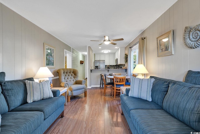 9501 Shore Dr Unit D-132, Myrtle Beach, SC 29572 - living room featuring ceiling fan and wood finished floors