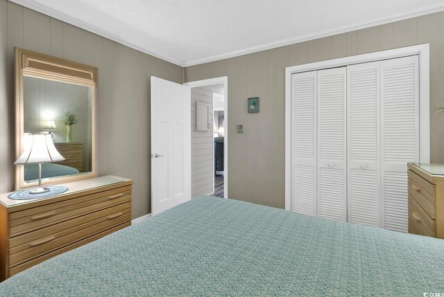 9501 Shore Dr Unit D-132, Myrtle Beach, SC 29572 - bedroom with ornamental molding and a closet