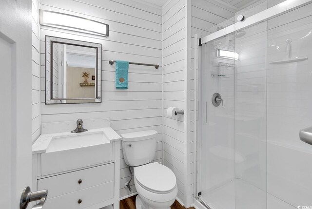 9501 Shore Dr Unit D-132, Myrtle Beach, SC 29572 - bathroom with a stall shower, vanity, and toilet
