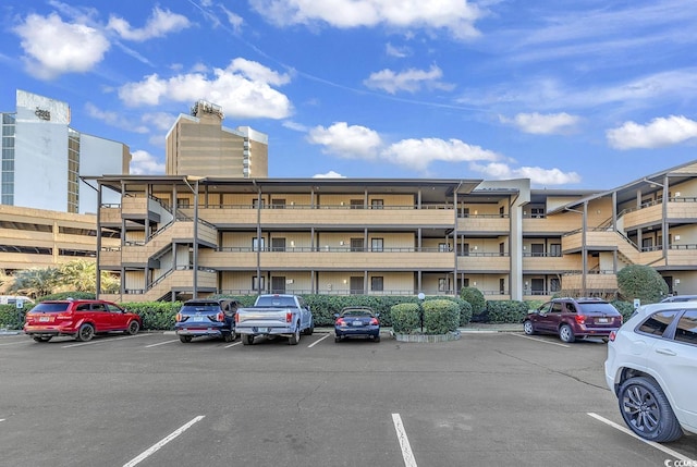 9501 Shore Dr Unit D-132, Myrtle Beach, SC 29572 - view of building exterior featuring uncovered parking