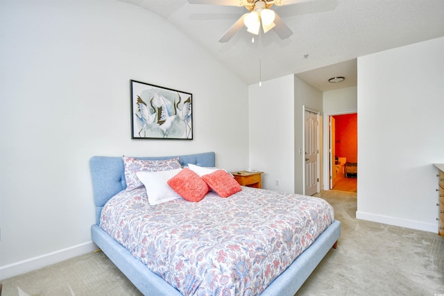 carpeted bedroom featuring baseboards, ceiling fan, and vaulted ceiling