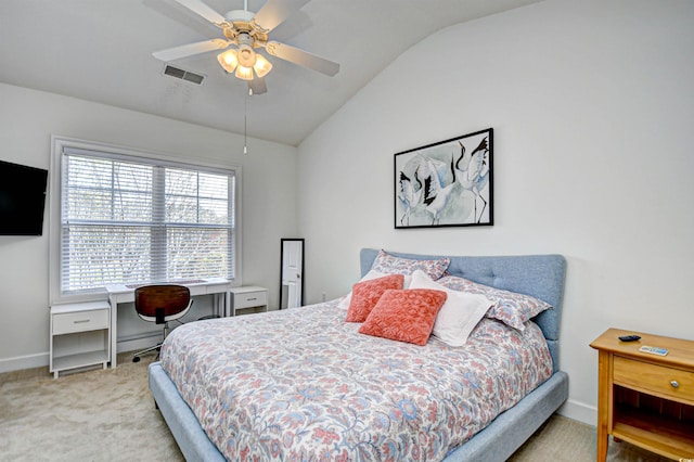 bedroom with visible vents, baseboards, carpet, lofted ceiling, and a ceiling fan