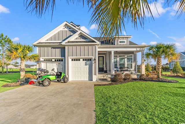 view of front of home featuring driveway, a porch, board and batten siding, a front yard, and a garage