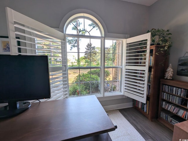 office space with wood finished floors