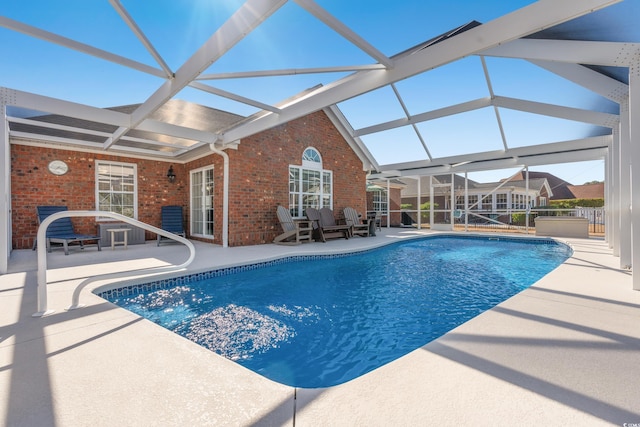 3516 Queens Harbour Blvd, Myrtle Beach, SC 29588 - swimming pool featuring a patio and glass enclosure
