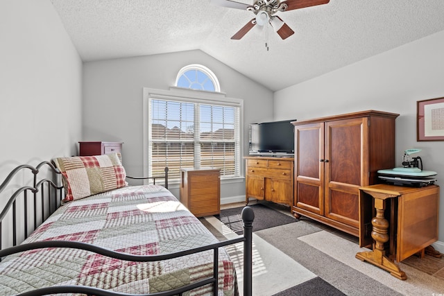3516 Queens Harbour Blvd, Myrtle Beach, SC 29588 - carpeted bedroom featuring vaulted ceiling, a textured ceiling, and a ceiling fan