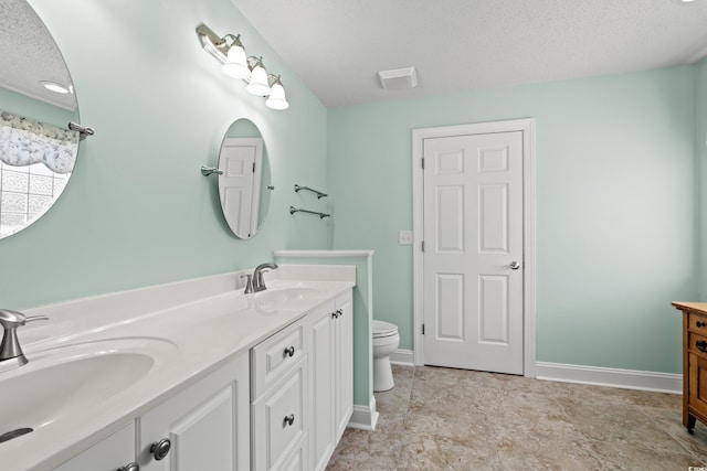 3516 Queens Harbour Blvd, Myrtle Beach, SC 29588 - bathroom featuring double vanity and a textured ceiling