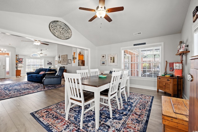 3516 Queens Harbour Blvd, Myrtle Beach, SC 29588 - dining room featuring a ceiling fan, lofted ceiling, wood finished floors, and healthy amount of natural light