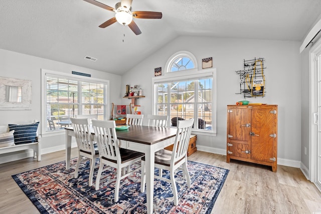 3516 Queens Harbour Blvd, Myrtle Beach, SC 29588 - dining area with ceiling fan, light wood-type flooring, plenty of natural light, and vaulted ceiling
