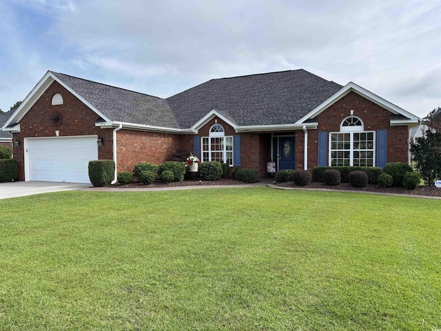 3516 Queens Harbour Blvd, Myrtle Beach, SC 29588 - view of front of house with a shingled roof, brick siding, a garage, a front yard, and concrete driveway