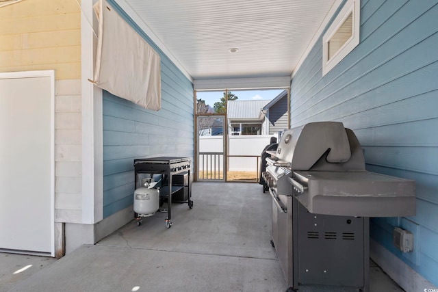 view of patio / terrace with fence and grilling area