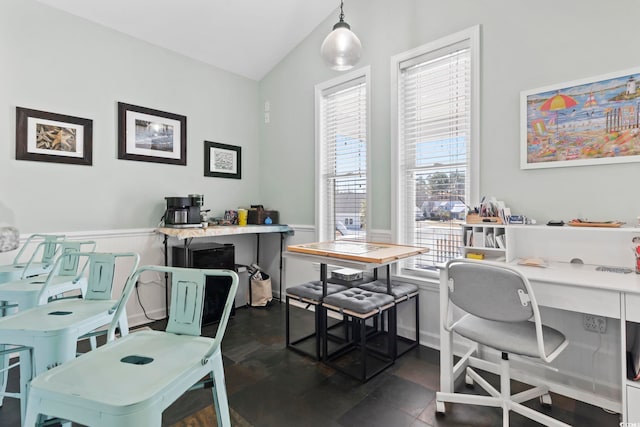 office space with vaulted ceiling