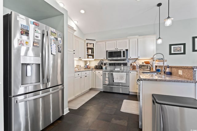 kitchen featuring open shelves, stainless steel appliances, lofted ceiling, a sink, and a peninsula