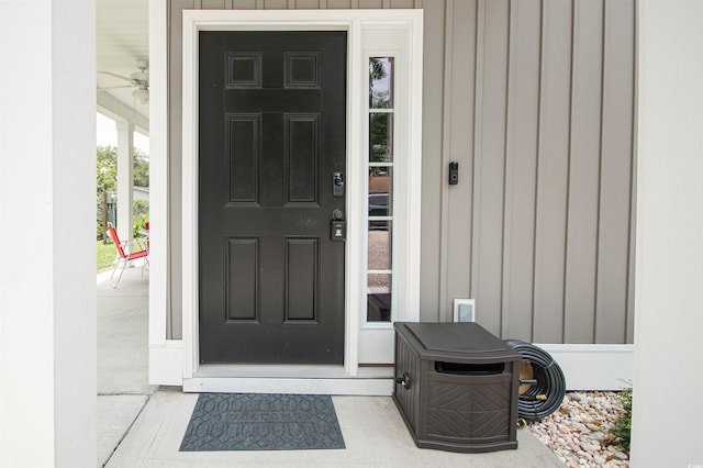 property entrance with board and batten siding