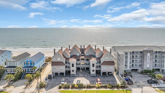 1113 N Ocean Blvd Unit 101, Surfside Beach, SC 29575 - drone / aerial view with a water view and a view of the beach