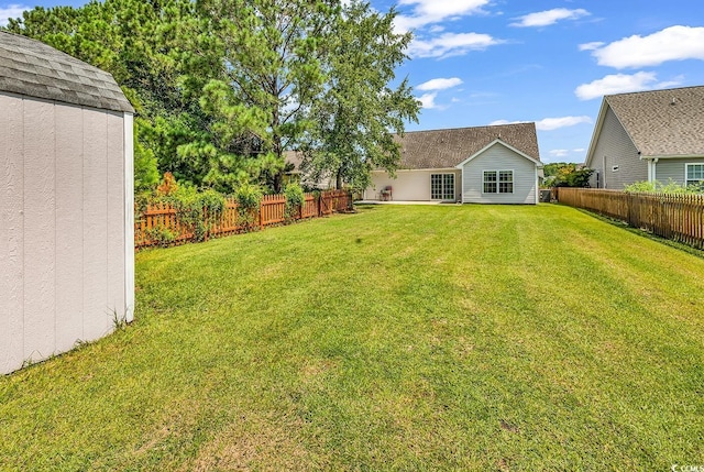 206 Balsa Dr, Longs, SC 29568 - fenced backyard with an outdoor structure